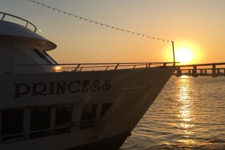 a close up of a boat next to a body of water